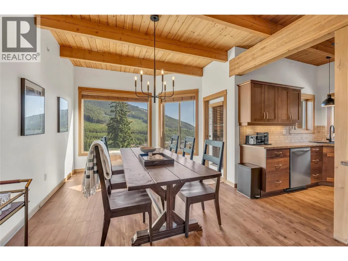 Dining area within the open main-floor layout at 14-306 Creekview Road.