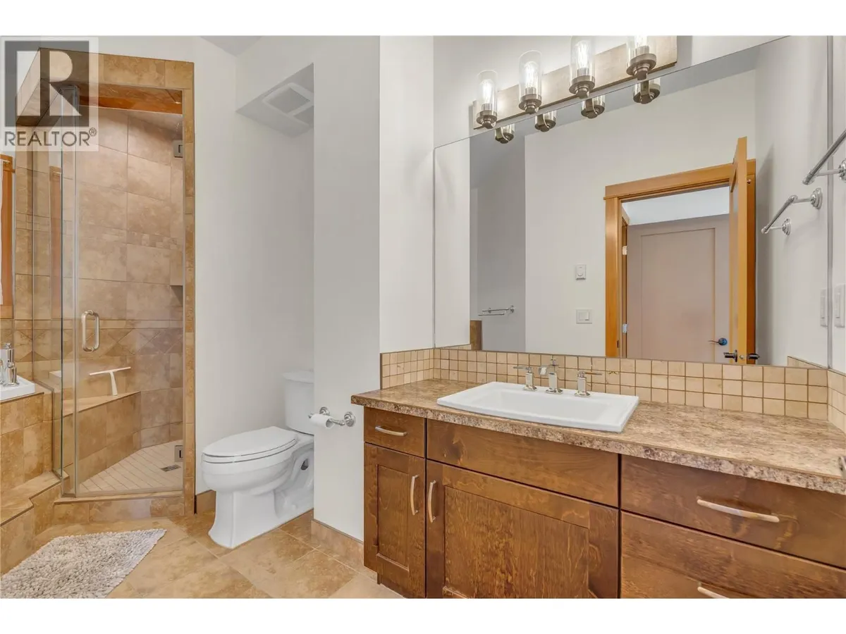 Bathroom with tiled tub and shower surround at 14-306 Creekview Road.