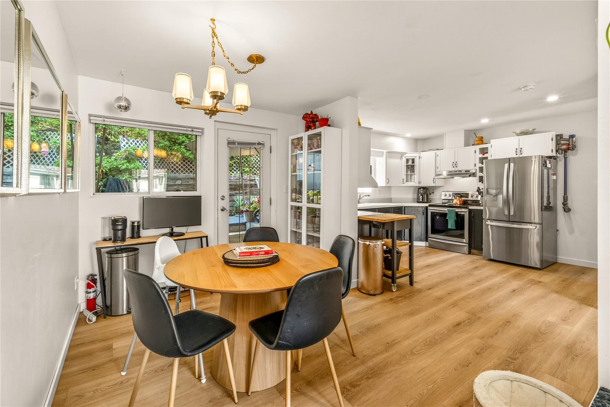 Dining area connected to the kitchen in Unit 156.