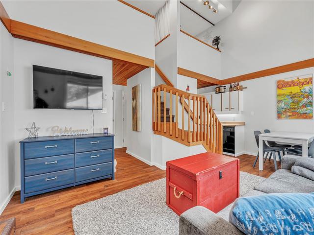 101-156 Clearview Crescent, Apex Mountain — vaulted open living area with staircase and dining space
