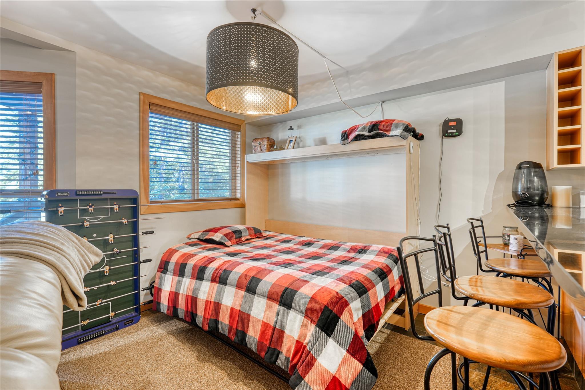 Living area with flexible sleeping space in Unit 3 at 360 Strayhorse Road.